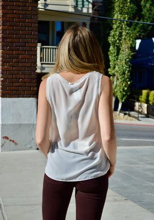 Feathered Sleeveless Blouse